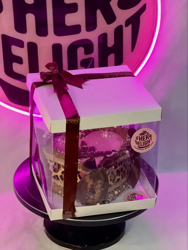 Vintage heart cake with bows in a gift box